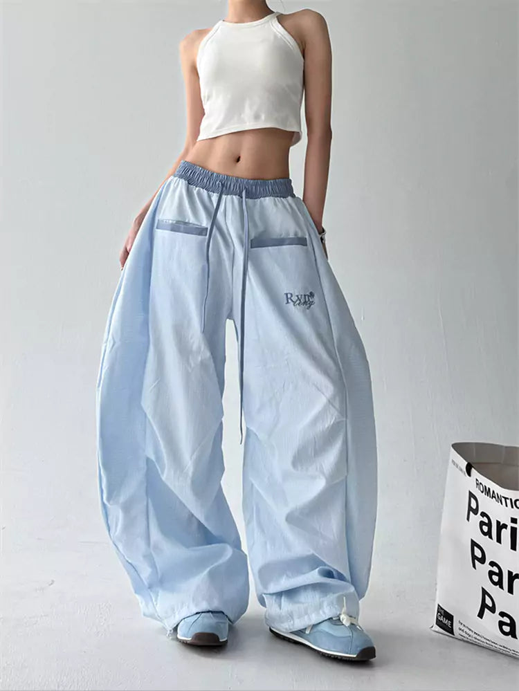 Pantalones holgados a rayas estilo urbano americano para mujer