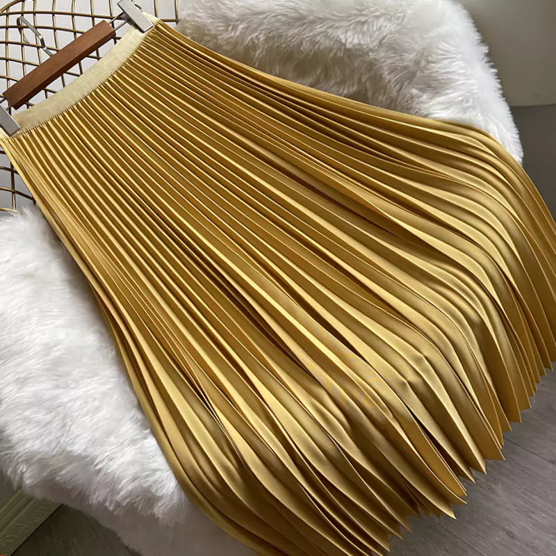 Eleganter, einfarbiger, hochtaillierter Faltenrock in Midi-Länge mit fließendem Fall