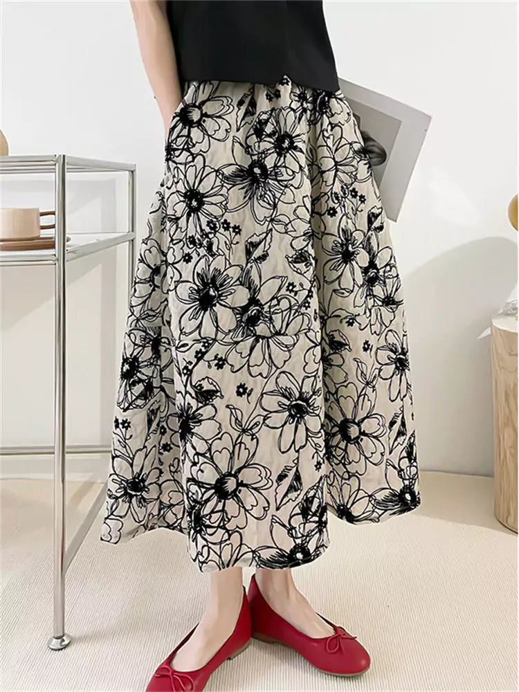 Falda midi francesa vintage artesanal de talle alto con flocado y corte A