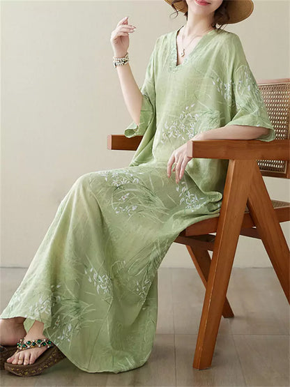 Locker geschnittenes Maxikleid im Vintage-Urlaubsstil aus Baumwoll-Leinen-Mischgewebe mit V-Ausschnitt