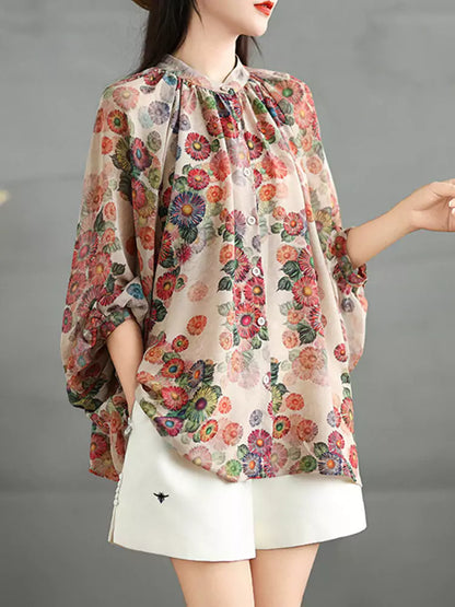 Leichte, langärmlige Bluse im Vintage-Stil mit Blumenmuster und Print.