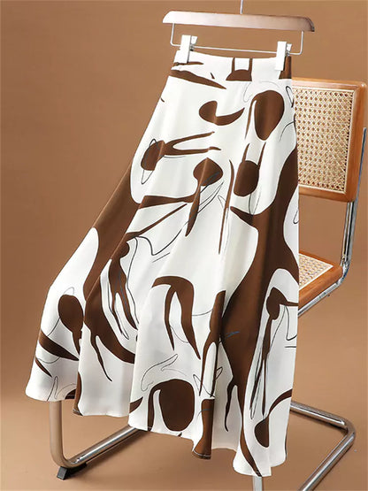 Hochtaillierter, fließender Chiffon-Midirock mit künstlerischem Tintenwasch-Print