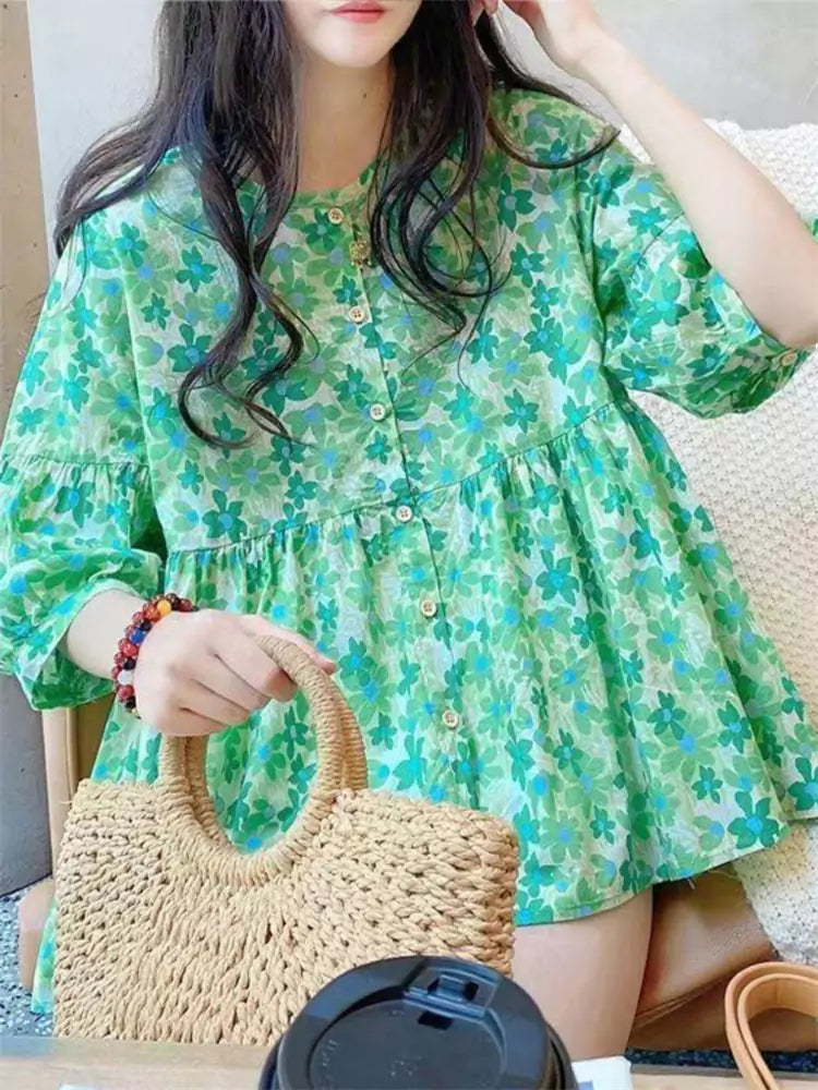 Blusa holgada estilo babydoll verde floral para mujer con cuello redondo y mangas farol