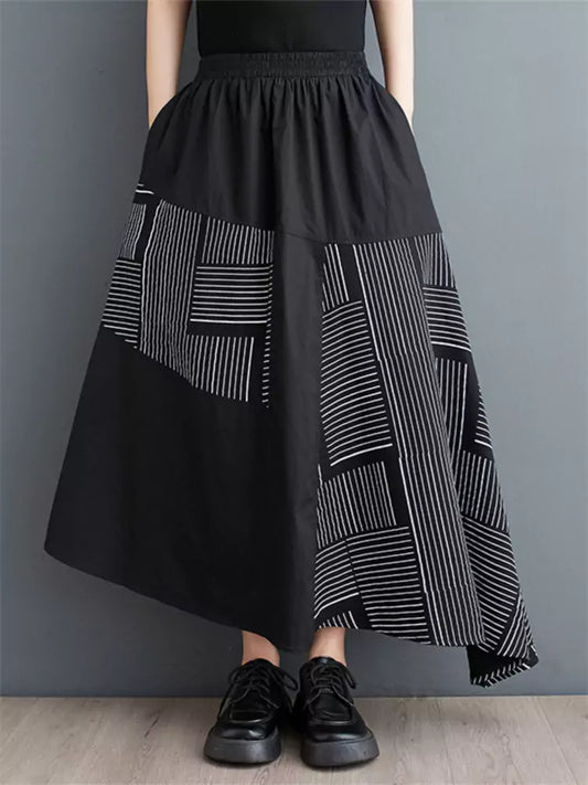 Schwarzer, bedruckter, lockerer Patchwork-Rock in asymmetrischer A-Linie für Damen