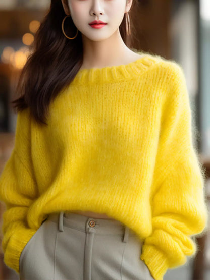 Suéter de punto francés elegante amarillo con cuello redondo para mujer con un estilo único y acogedor.