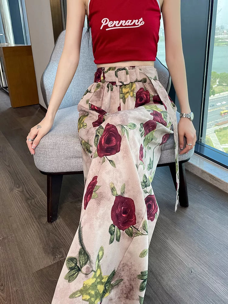 Pantalones anchos de cintura alta con estampado rosa para mujer 