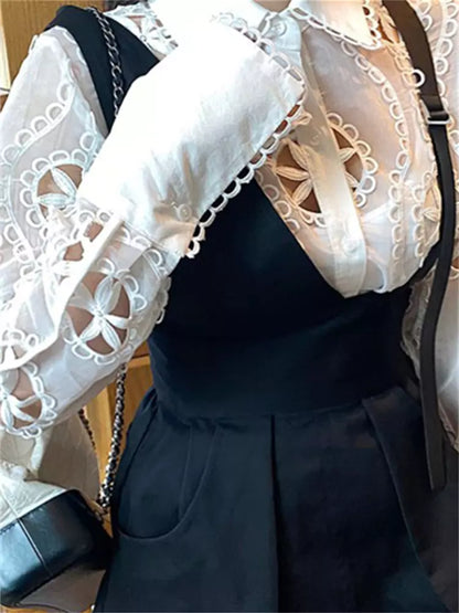 Elegante Bluse aus Spitzenmesh mit Rüschenkragen und Puffärmeln