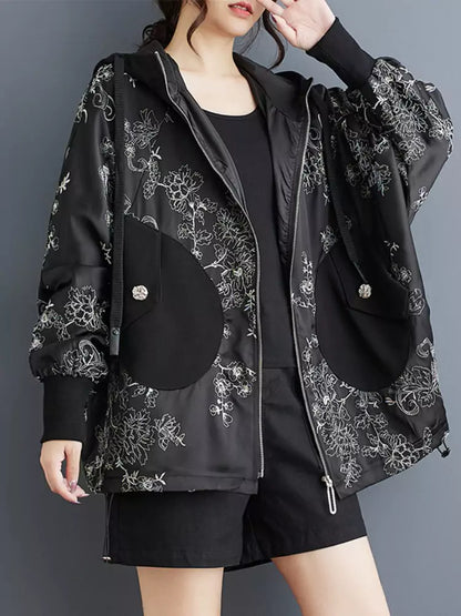 Stylischer Oversize-Kapuzenpullover mit Reißverschluss und aufwendiger Stickerei