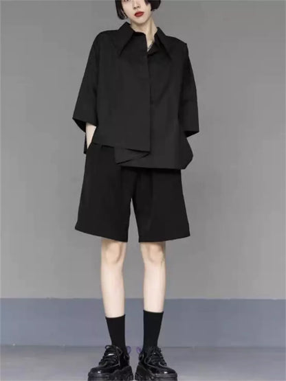 Lässiges und vielseitiges asymmetrisches schwarzes Damenhemd mit einzigartigem Designer-Stil