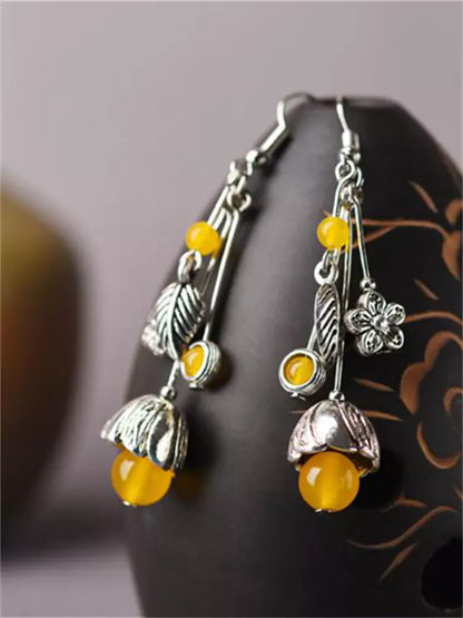 Lange Ohrhänger aus tibetischem Silber und gelbem Achat im ethnischen Palaststil