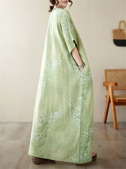 Locker geschnittenes Maxikleid im Vintage-Urlaubsstil aus Baumwoll-Leinen-Mischgewebe mit V-Ausschnitt