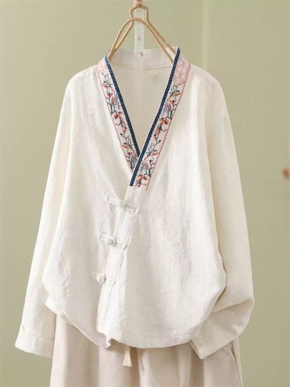 Damenbluse aus Baumwoll-Leinen-Mischgewebe mit Jacquard-Stickerei, asymmetrischer Knopfleiste und Froschknöpfen