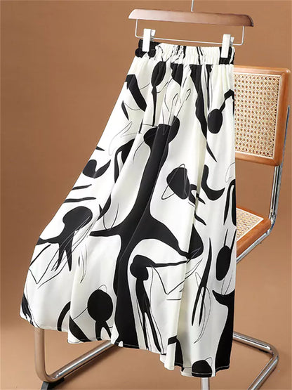 Hochtaillierter, fließender Chiffon-Midirock mit künstlerischem Tintenwasch-Print