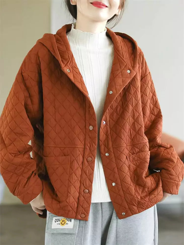 Orangefarbene, wattierte Baumwolljacke mit Kapuze für Damen