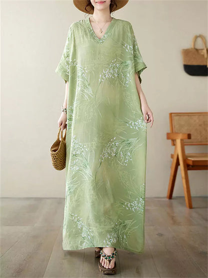 Locker geschnittenes Maxikleid im Vintage-Urlaubsstil aus Baumwoll-Leinen-Mischgewebe mit V-Ausschnitt