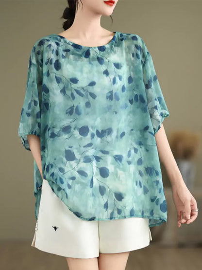 Sommerliches Babydoll-Top mit Blumenmuster und Bindeband am Rücken in großen Größen für Damen