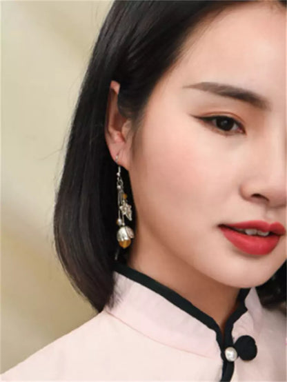 Lange Ohrhänger aus tibetischem Silber und gelbem Achat im ethnischen Palaststil