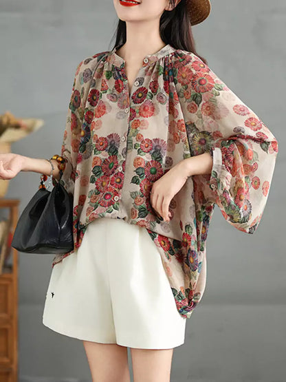 Leichte, langärmlige Bluse im Vintage-Stil mit Blumenmuster und Print.