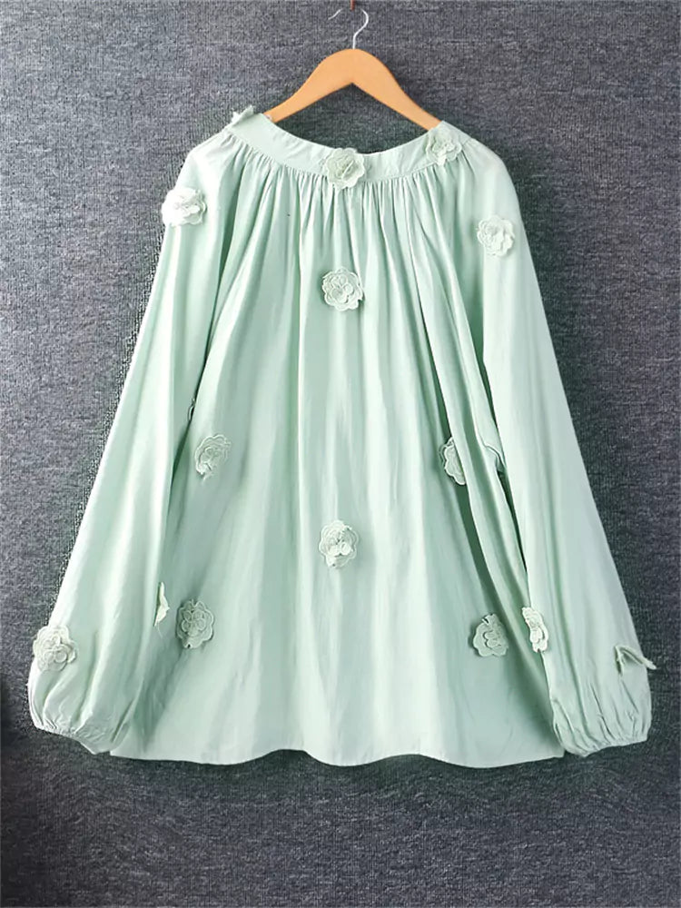 Blusa de lino y algodón bordada con cuello anudado y apliques para mujer