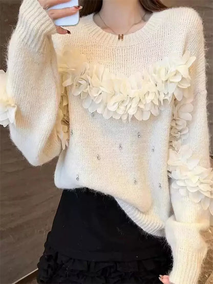 Suéter rosa con flores 3D y adornos de diamantes de imitación: tejido único y elegante.