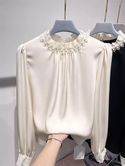 Elegante, plissierte Chiffonbluse mit Perlenbesatz, Stehkragen und langen Ärmeln im französischen Stil für Damen