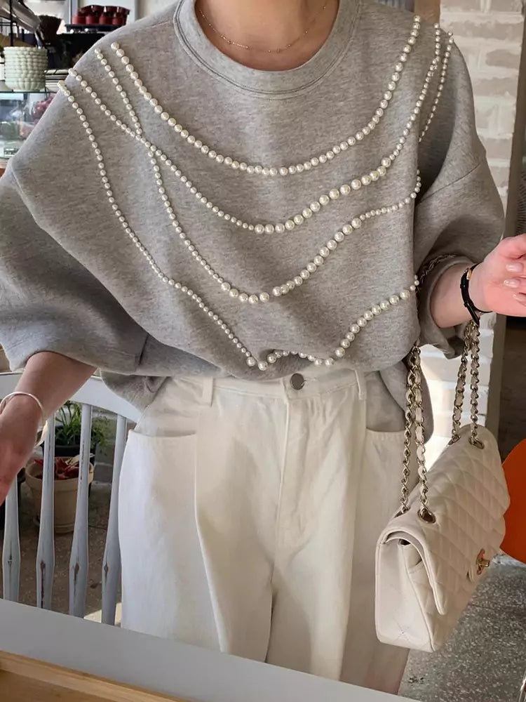 Aprikosenfarbenes, perlenbesetztes Kurzarm-T-Shirt für Damen