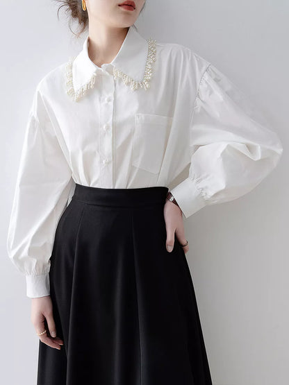 Damen-Poloshirt mit weißem Perlendekor und Laternenärmeln