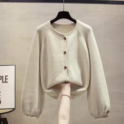 Cárdigan de punto con cuello redondo y botones en color liso para mujer