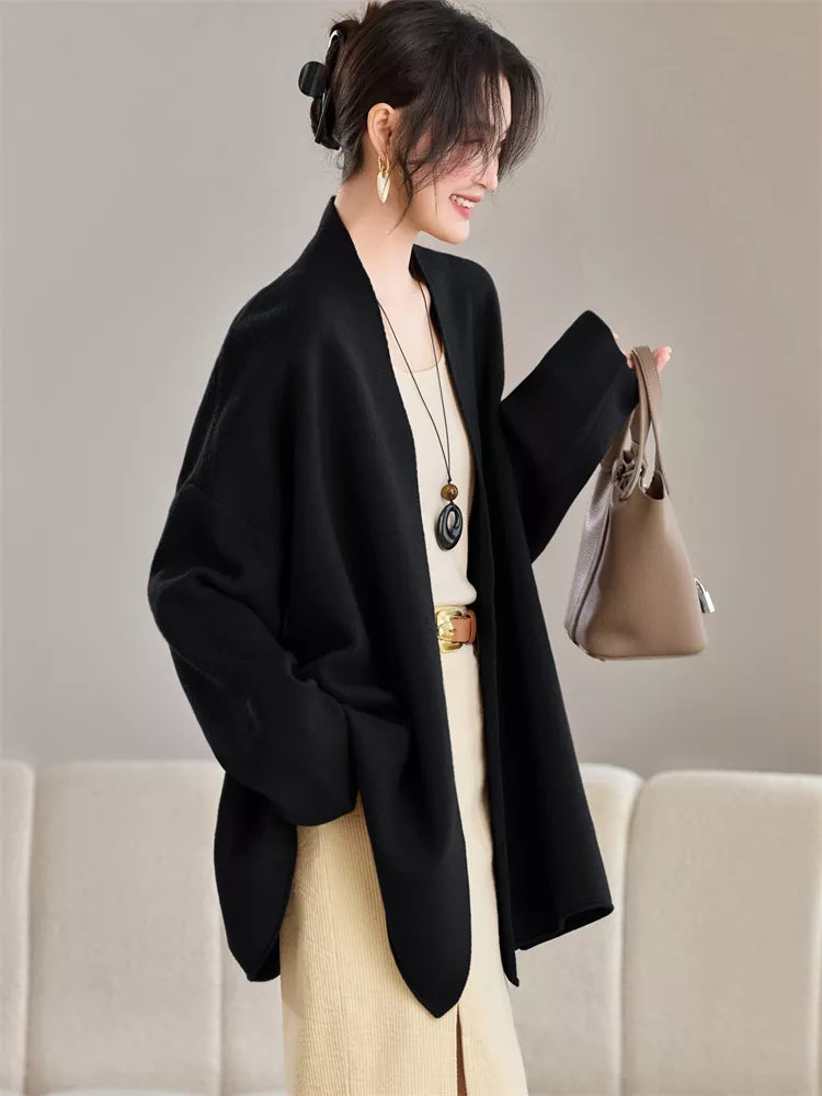 Elegante cárdigan largo de punto marrón para mujer