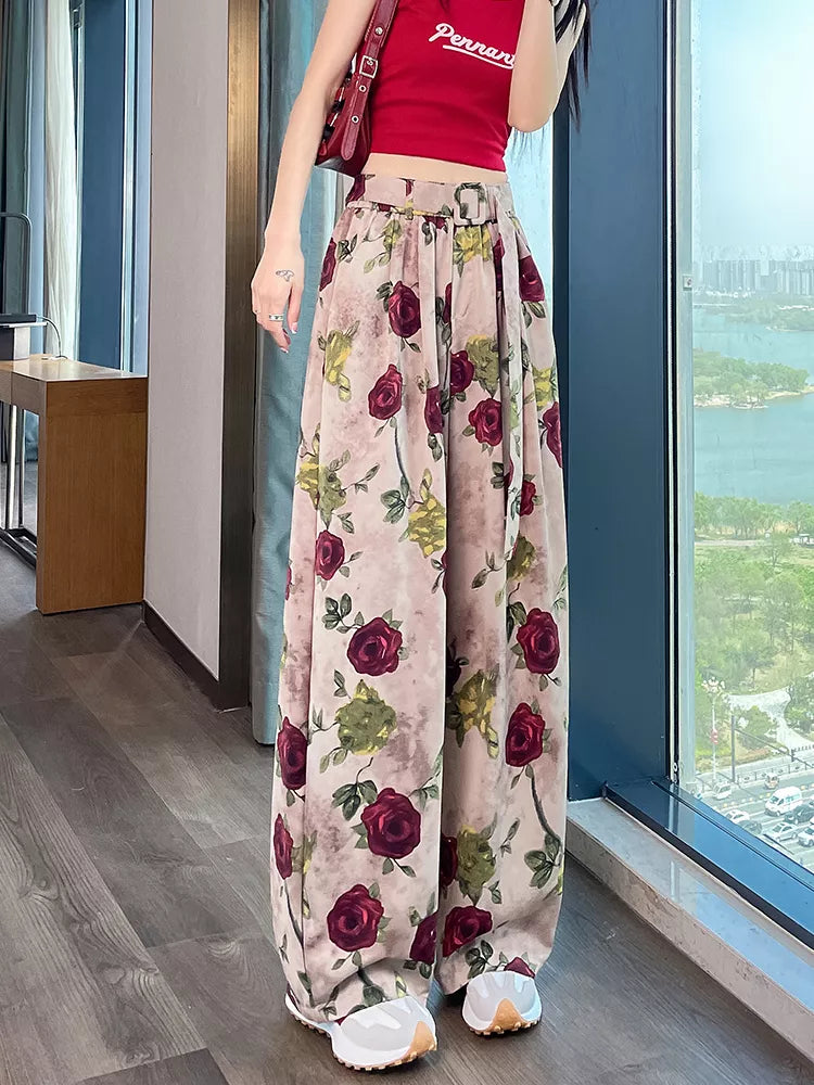 Pantalones anchos de cintura alta con estampado rosa para mujer 