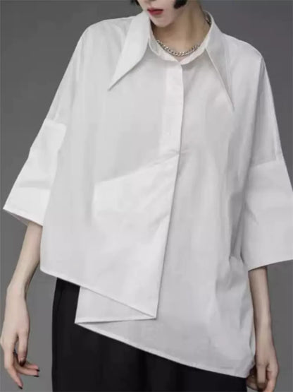 Lässiges und vielseitiges asymmetrisches schwarzes Damenhemd mit einzigartigem Designer-Stil