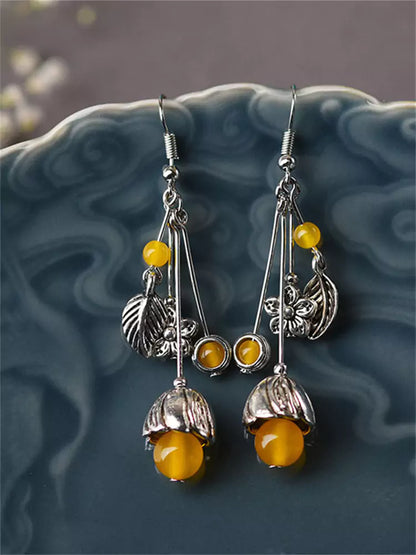 Lange Ohrhänger aus tibetischem Silber und gelbem Achat im ethnischen Palaststil