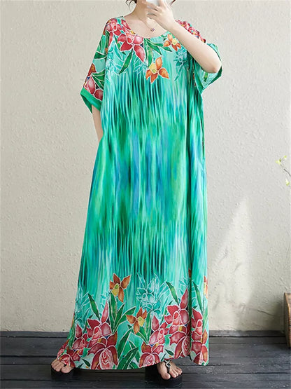 Sommerliches Strandkleid im Boho-Stil in großen Größen mit Rundhalsausschnitt – elegant und künstlerisch.