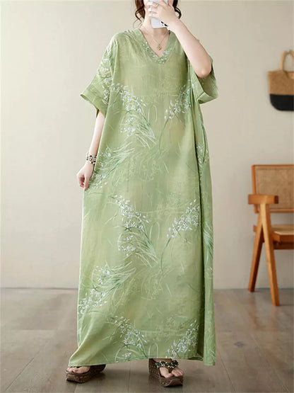 Locker geschnittenes Maxikleid im Vintage-Urlaubsstil aus Baumwoll-Leinen-Mischgewebe mit V-Ausschnitt