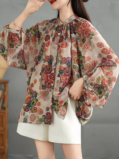 Leichte, langärmlige Bluse im Vintage-Stil mit Blumenmuster und Print.