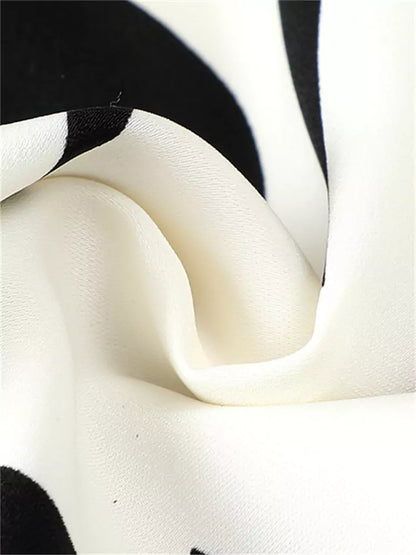 Hochtaillierter, fließender Chiffon-Midirock mit künstlerischem Tintenwasch-Print