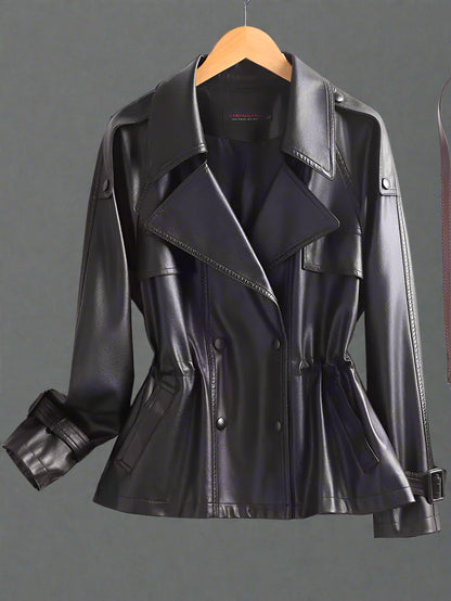 Black leather jacket on a wooden hanger against a white background