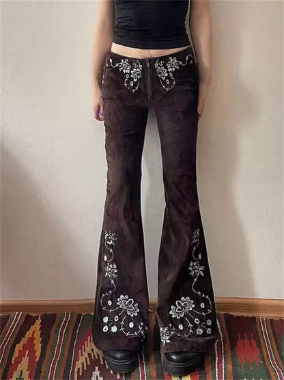 Vaqueros acampanados con bordados vintage para mujer