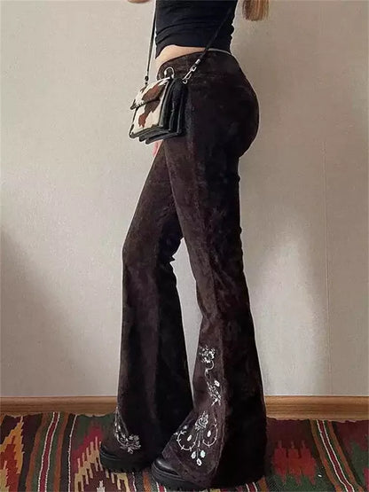 Vaqueros acampanados con bordados vintage para mujer