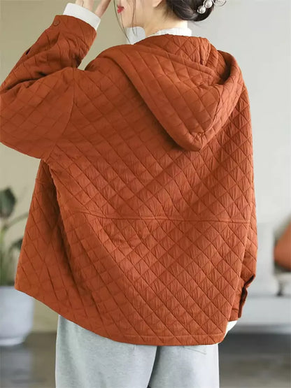 Orangefarbene, wattierte Baumwolljacke mit Kapuze für Damen