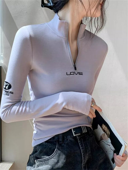 Halbgeschlossenes, langärmeliges, figurbetontes Oberteil mit Reißverschluss für Damen