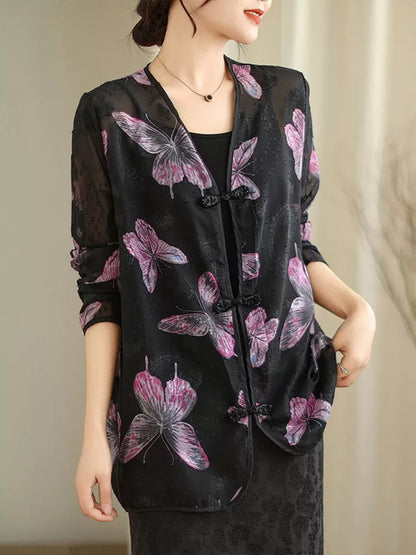 Schwarze, bedruckte Bluse mit V-Ausschnitt und Froschknöpfen für Damen