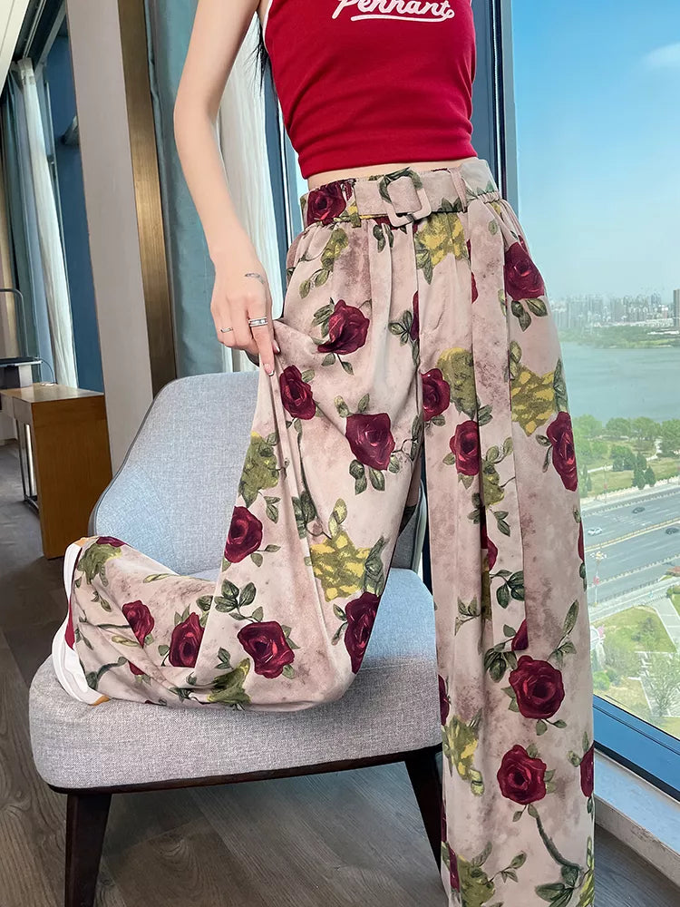 Pantalones anchos de cintura alta con estampado rosa para mujer 