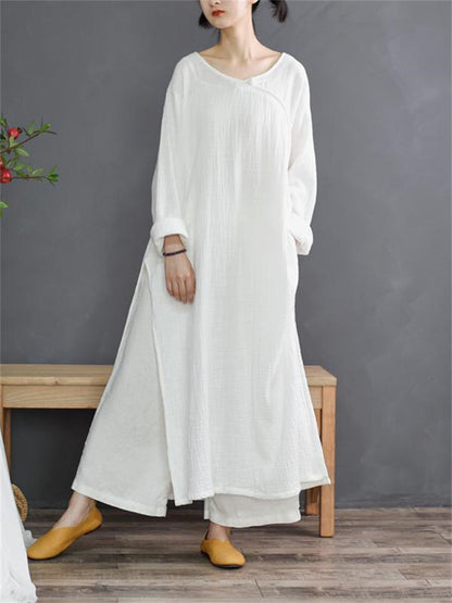 Gelbes Maxikleid im Vintage-Zen-Stil aus Baumwoll-Leinen für Damen mit Seitenschlitz, gekreuztem Kragen und Froschknöpfen