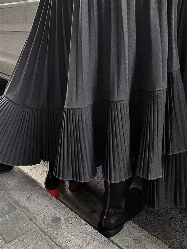 High-Waist Black Pleated Midi Skirt with Irregular Fishtail Hem