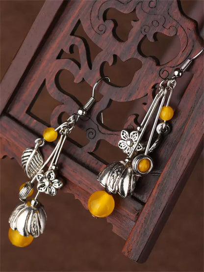 Lange Ohrhänger aus tibetischem Silber und gelbem Achat im ethnischen Palaststil