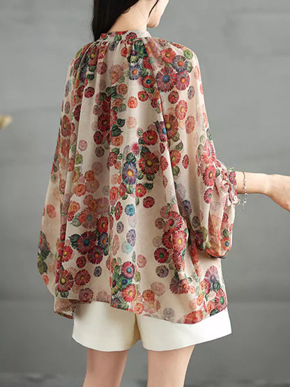 Leichte, langärmlige Bluse im Vintage-Stil mit Blumenmuster und Print.