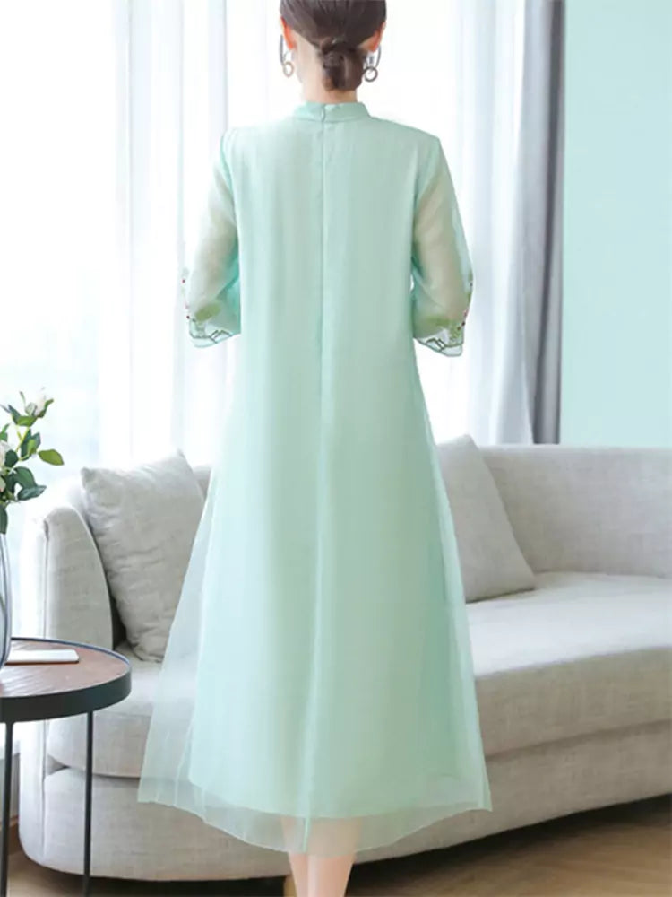 Elegant Modern Cheongsam-Inspired Long Dress with Floral Stitching