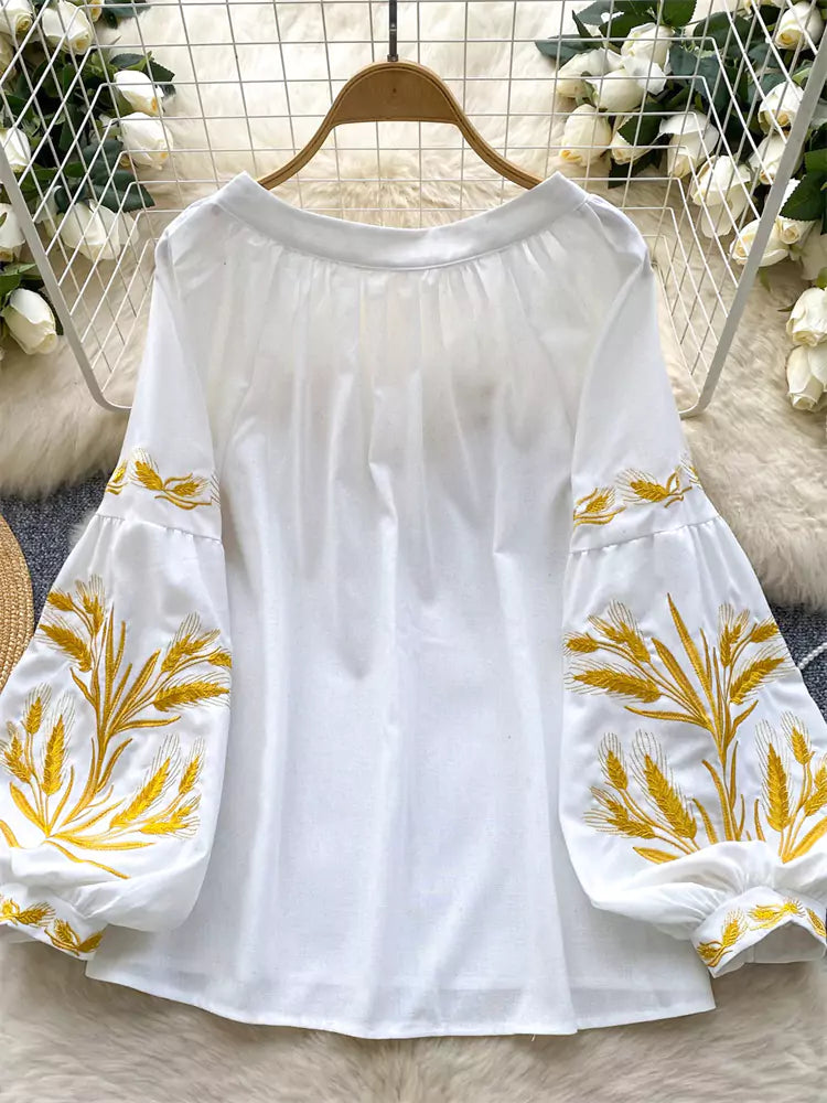 Vintage-Bluse im Bohème-Stil mit Stickerei, Bindekragen und Laternenärmeln für Damen