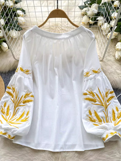 Vintage-Bluse im Bohème-Stil mit Stickerei, Bindekragen und Laternenärmeln für Damen